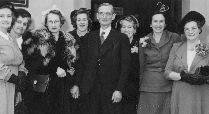 Robert Cooper and his seven daughters