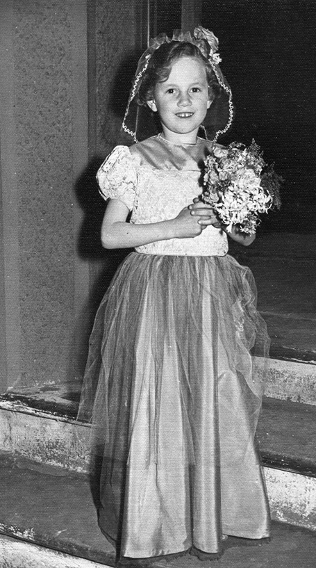 Jennifer as a flower girl at her cousins wedding