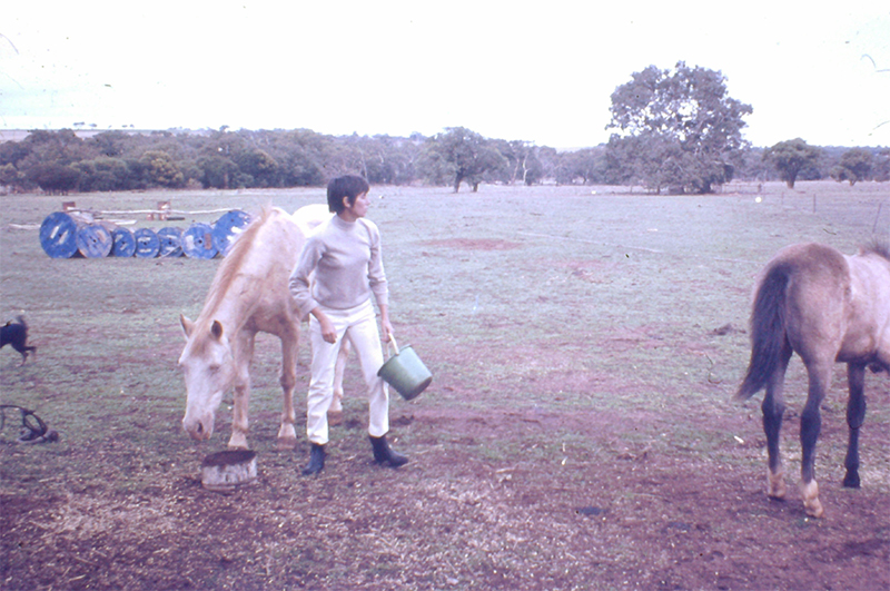 Jen on the farm with Snowy and Moonshine and Tiny the kelpie