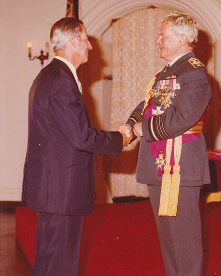 Jim recieving his OBE